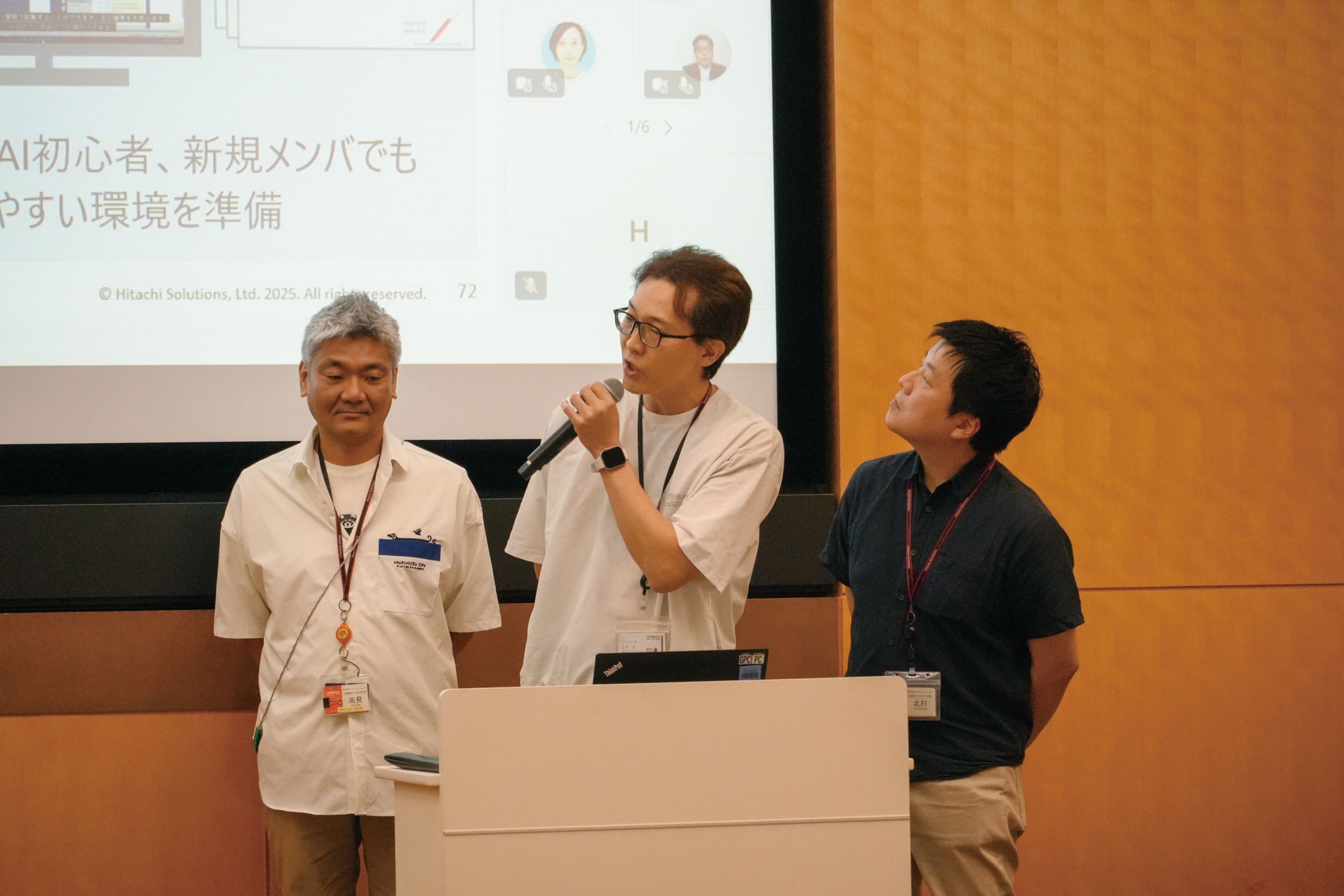 AXチャレンジ100で発表する社員